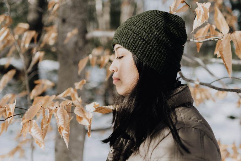 Sine Beauty 19 Person experiencing cold weather acne during September travel